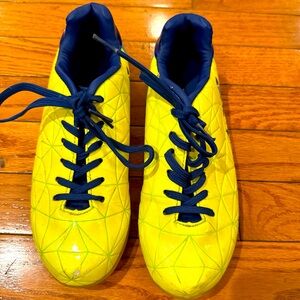 bright yellow and navy blue indoor soccer cleats!